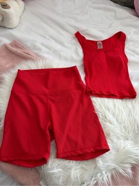 Red Aritzia biker shorts and tank set
Small bottoms, XS top